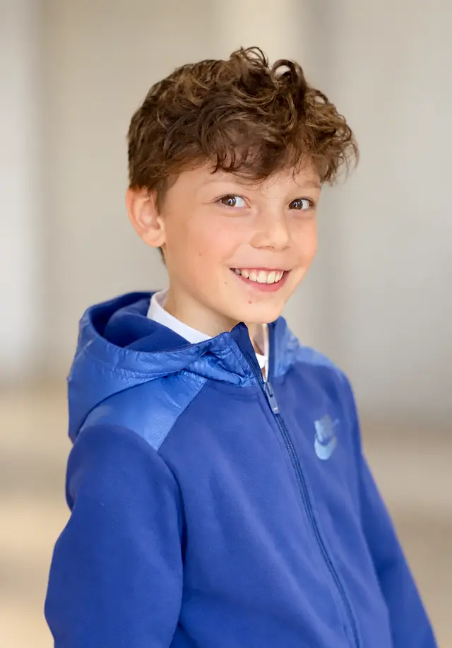 Jan Gorochov - smiling portrait of a young actor based in Prague